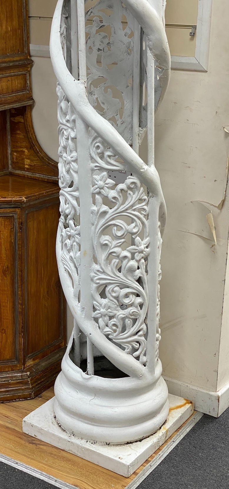 A pair of large white painted fibre glass helical columns, height 239cm